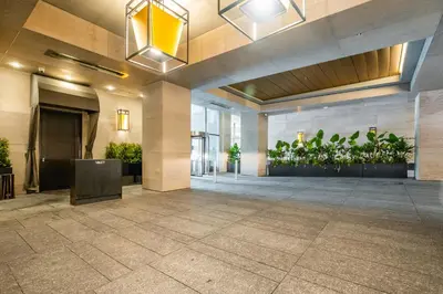 a lobby with potted plants on the wall at Traveller home in centre Toronto in Toronto