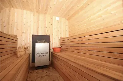 a sauna with a sign in the middle of it at La Datcha 20 Acres Private Spa, with Pool, Jacuzzi & Wood Burning Sauna in Cookstown