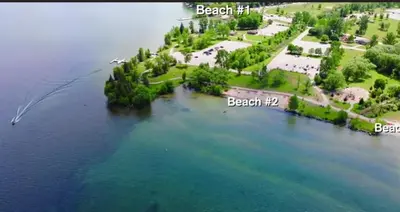 an aerial view of an island in the water at La Datcha 20 Acres Private Spa, with Pool, Jacuzzi & Wood Burning Sauna in Cookstown