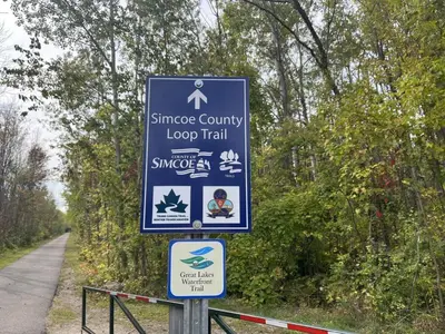a sign for a singapore country loop trail at Impressive Modern Waterfront Home on Georgian Bay in Port McNicoll