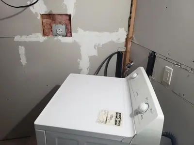 a white machine in a room with a wall at Luxurious 1BR-1BA Apartment Bright Spacious with free parking-gc-1 in Brampton