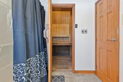 a door to a room with a curtain and a shelf at Semi Detached Mountain View Chalet in Blue Mountains