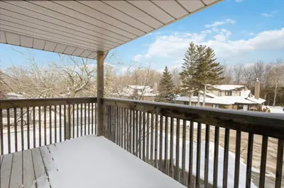 a covered deck with snow on it at Collingwood Chalet Near Blue Mountain Slopes 39A in Collingwood