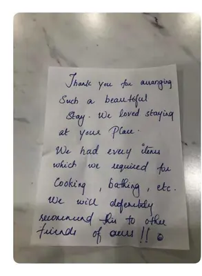a handwritten letter on a white paper on a counter at Family Friendly - HOT TUB - Near Toronto & UOIT in Oshawa