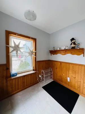a room with a window with two stars on the wall at Casa Maria Irena in Meaford
