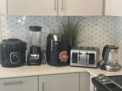 a kitchen counter with a blender and a toaster at Your Perfect Getaway Master Bedroom in Bradford