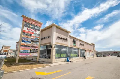 a large building with a sign in front of it at Unwind Here in a Stylish and Cozy Space in Bradford
