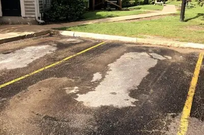 aphalt street with a large puddle of water on it at Mountainside Studio Bliss Pool, Hot Tubs, At the Mountain in Blue Mountains