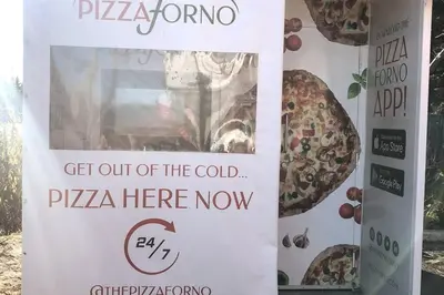 a sign that reads get out of the cold pizza here now at Mountainside Studio Bliss Pool, Hot Tubs, At the Mountain in Blue Mountains
